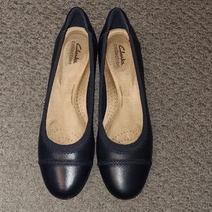 Clarks Women's Navy Sara Bay flats in women's size 12M